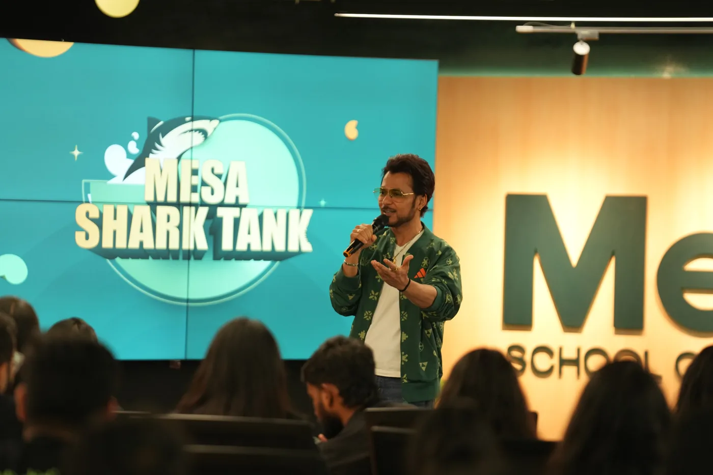 A founder speaking to students at Mesa Shark Tank