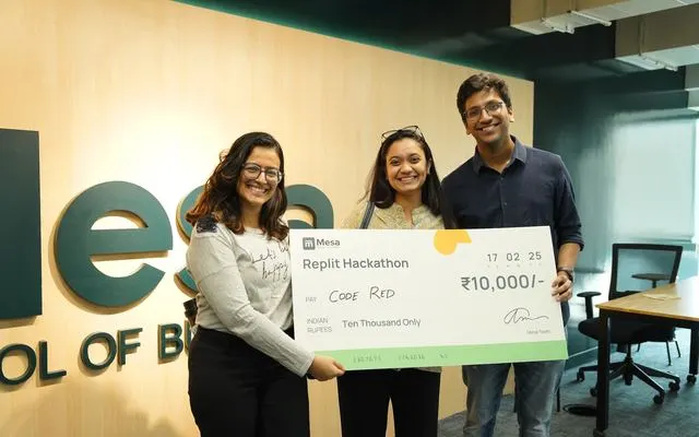 Winners of the Mesa Replit Hackathon with their prize cheque