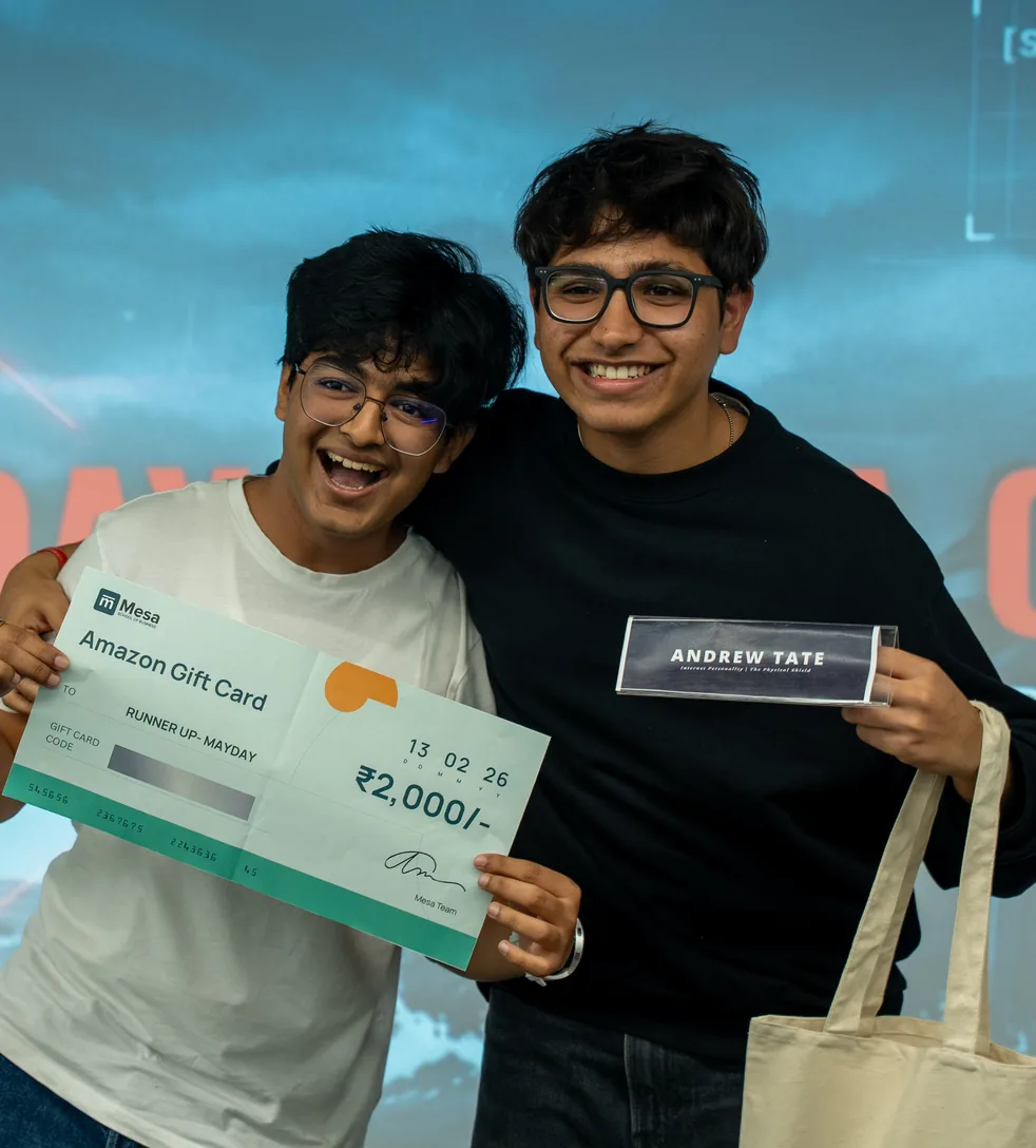Hackathon winners holding their prize cheque