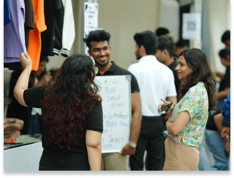 Interact with real customers while building a business